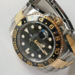 sportovní model Rolex na kovovém tahu typu Oyster