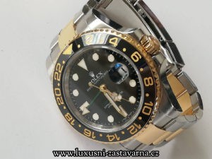 sportovní model Rolex na kovovém tahu typu Oyster