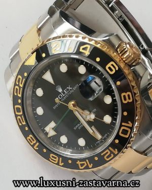 sportovní model Rolex na kovovém tahu typu Oyster